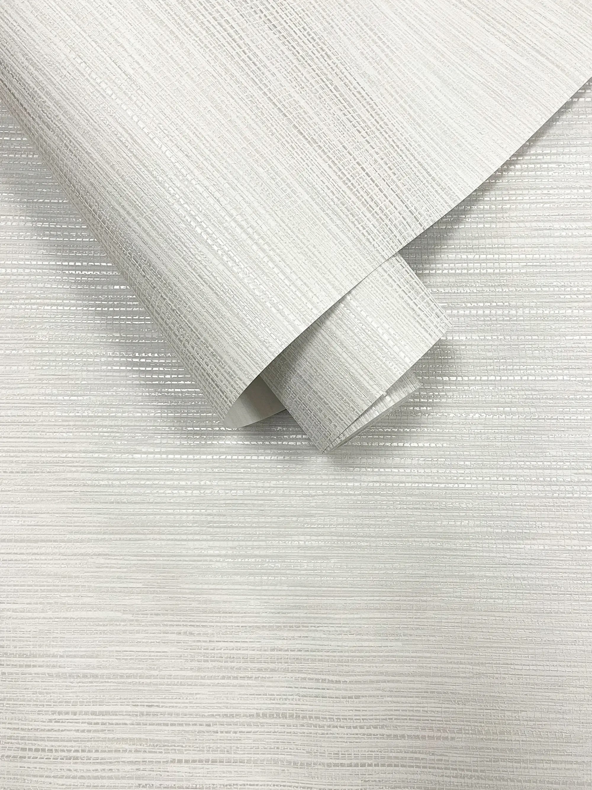 Materialeprøve af Bambara Texture - White tapet, der viser tapetets detaljerede struktur og kvalitet.