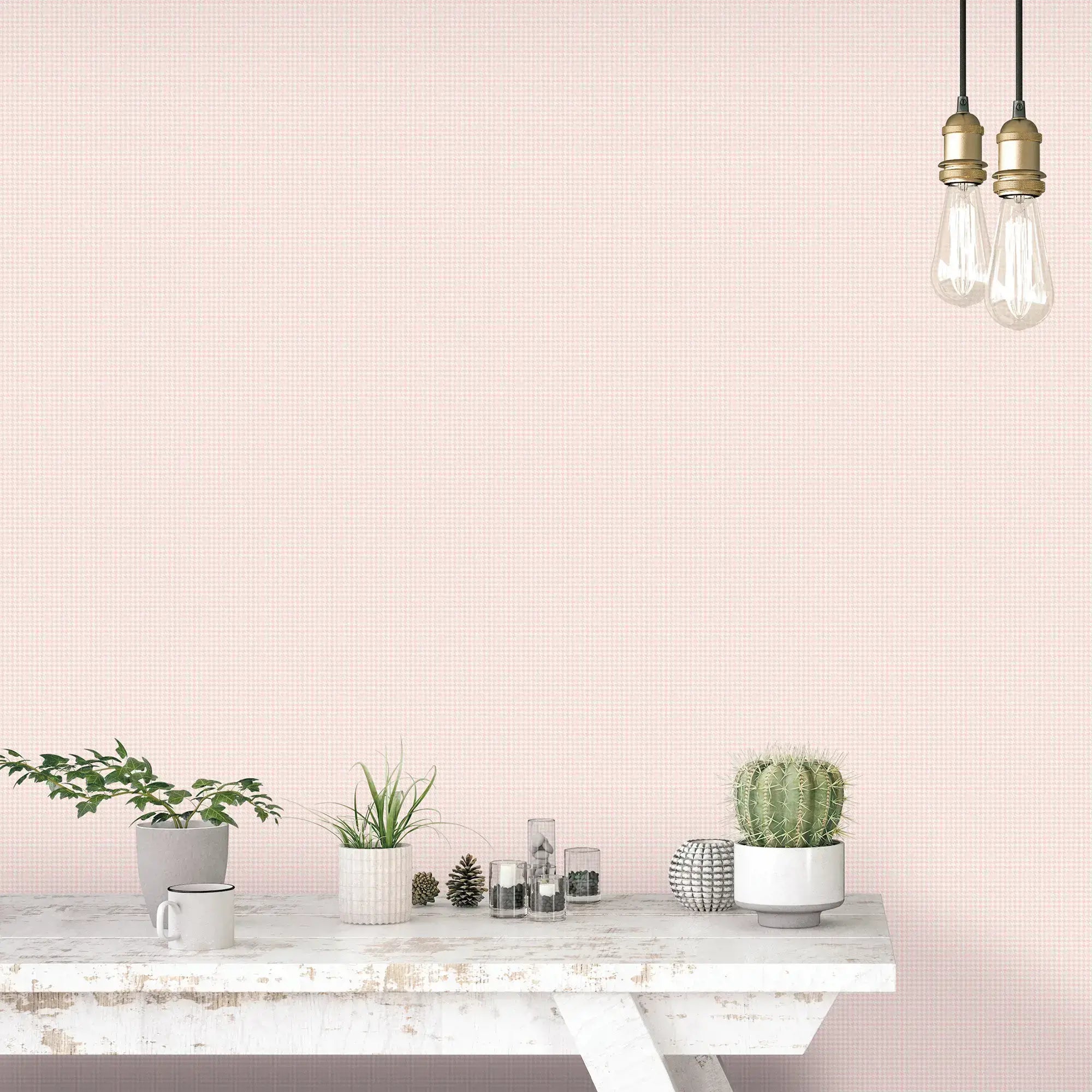 Interiørbillede med Delicate Houndstooth - Blush tapet fra Nicetapet.dk. Vægdekorationen i rosa med houndstooth mønster bag en hvid bordplade med planter og loftlamper.